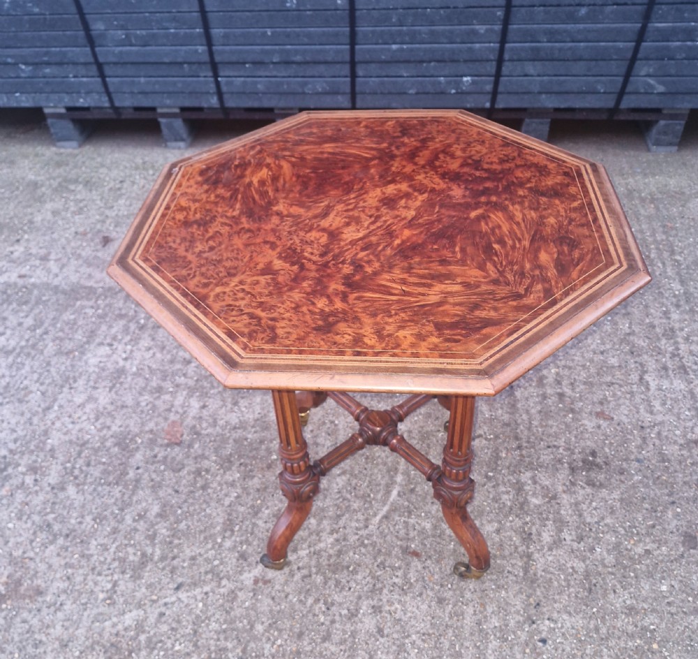 Late Victorian occasional table following a Gillows design . View VIII