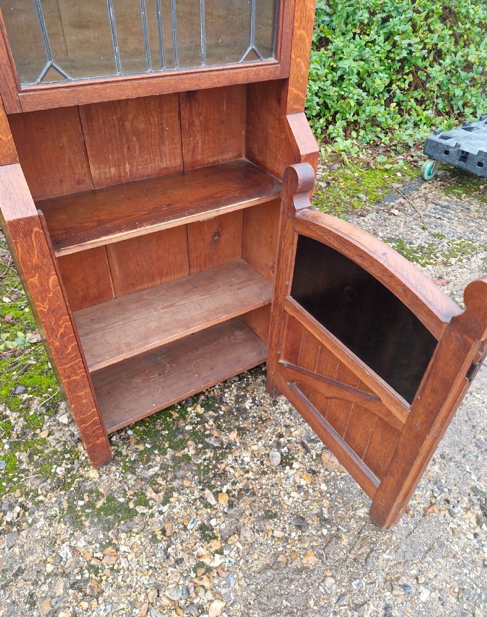 Unusual arts and crafts oak bookcase cabinet.  View II