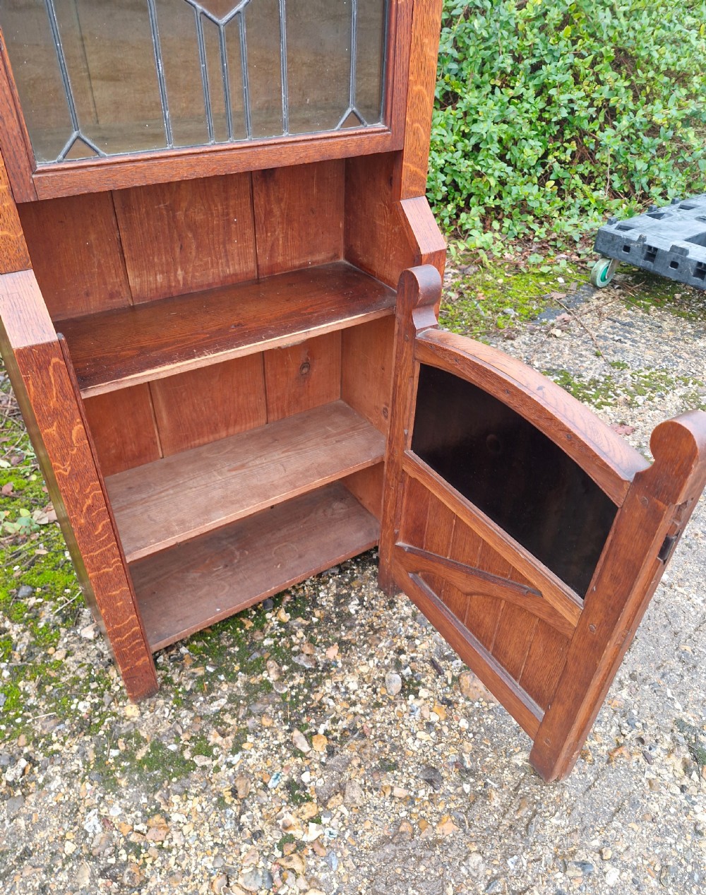 Unusual arts and crafts oak bookcase cabinet.  View III
