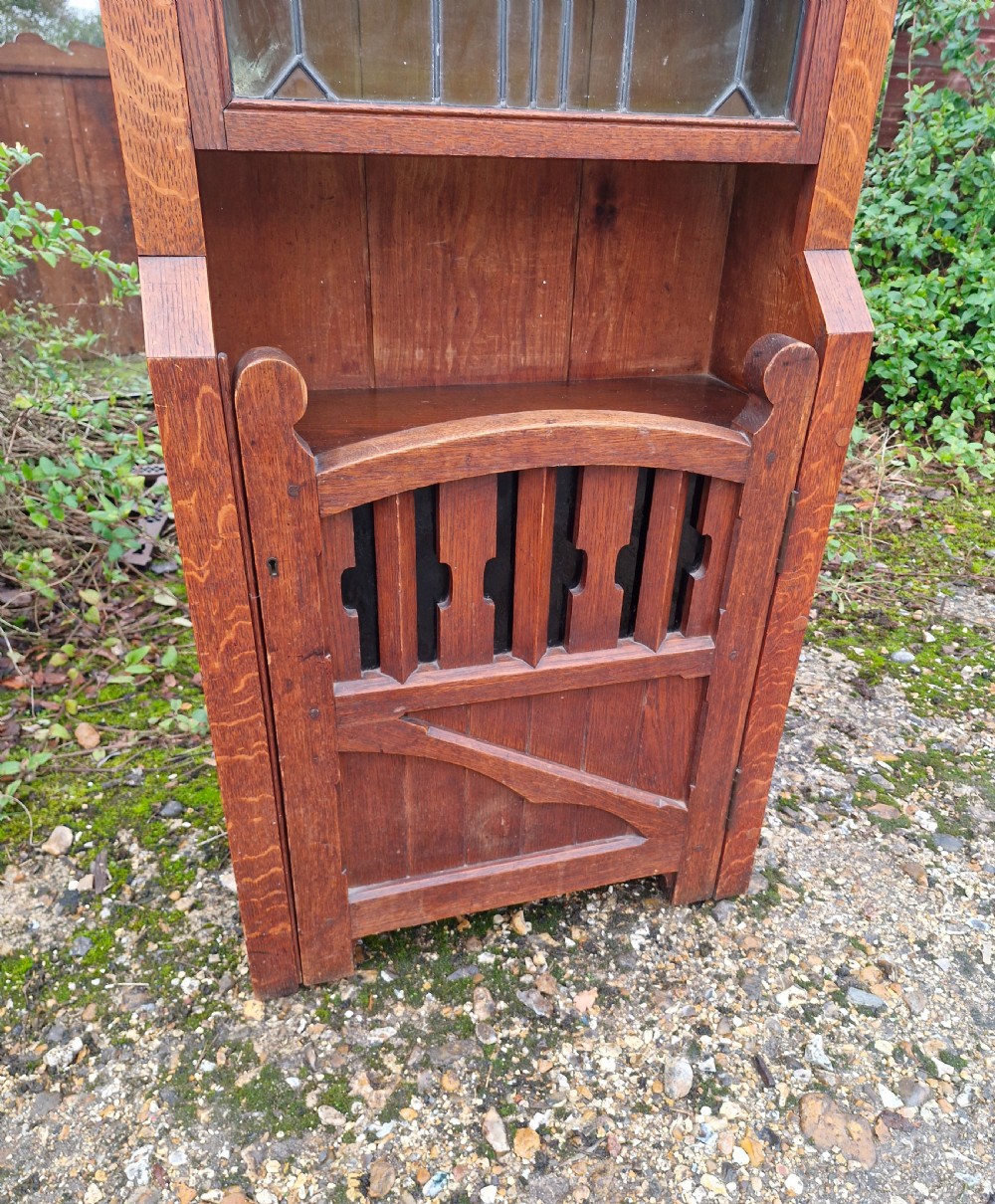 Unusual arts and crafts oak bookcase cabinet.  View VI