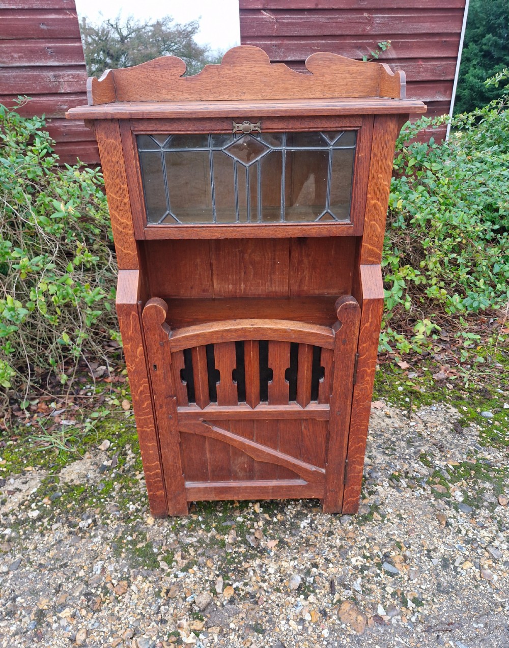 Unusual arts and crafts oak bookcase cabinet.  View VII