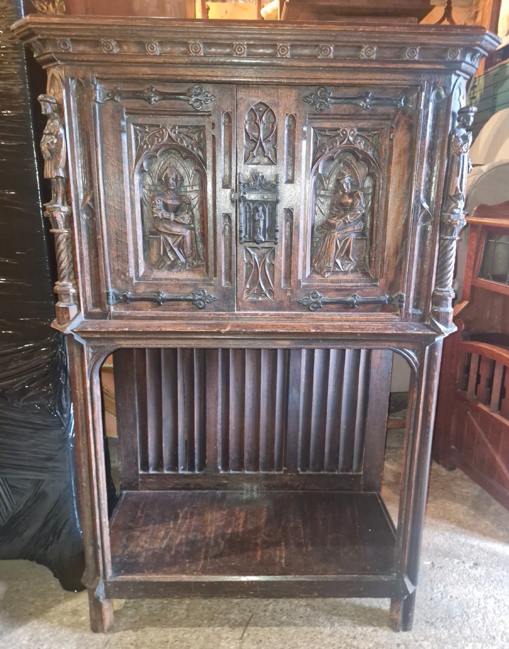 Victorian carved oak Gothic revival hall cupboard. 