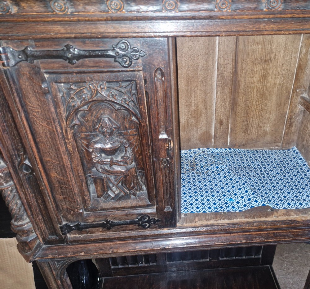 Victorian carved oak Gothic revival hall cupboard.  View VI