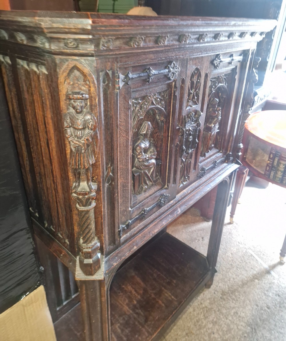 Victorian carved oak Gothic revival hall cupboard.  View VIII