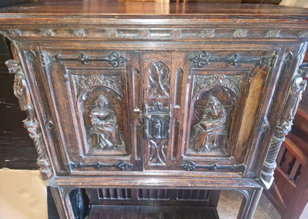 Victorian carved oak Gothic revival hall cupboard.  View IX