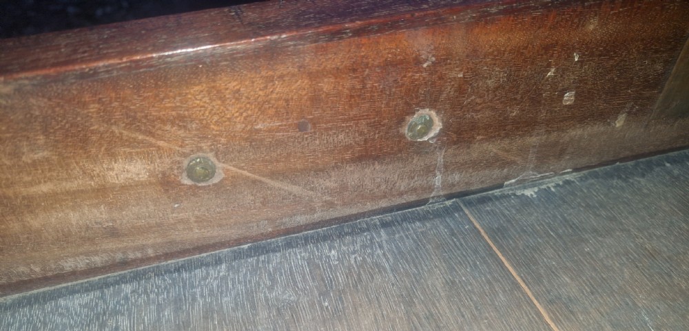 A Georgian mahogany bachelors chest featuring four drawers, a pull-out brushing slide, brass swan-neck handles, and bracket feet. View IX