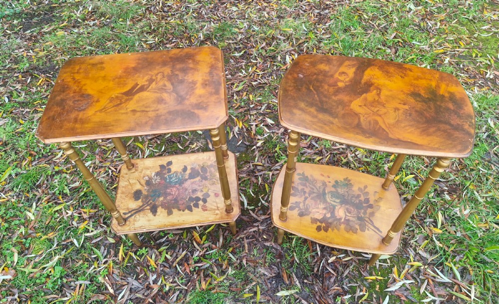 A pair of two-tier rectangular occasional tables featuring gold-painted turned legs, painted figurative scenes on the top surfaces, and floral artwork on the lower shelves. View VIII