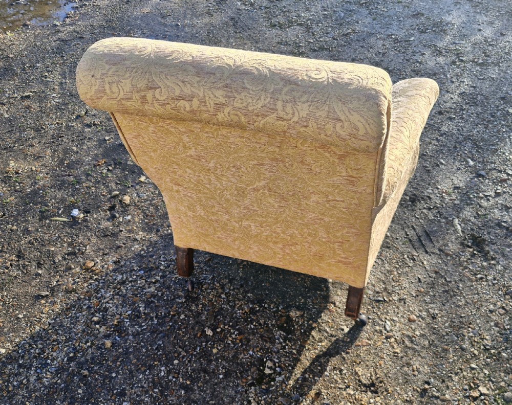 Late Victorian upholstered armchair in the style of Howard.  View IV