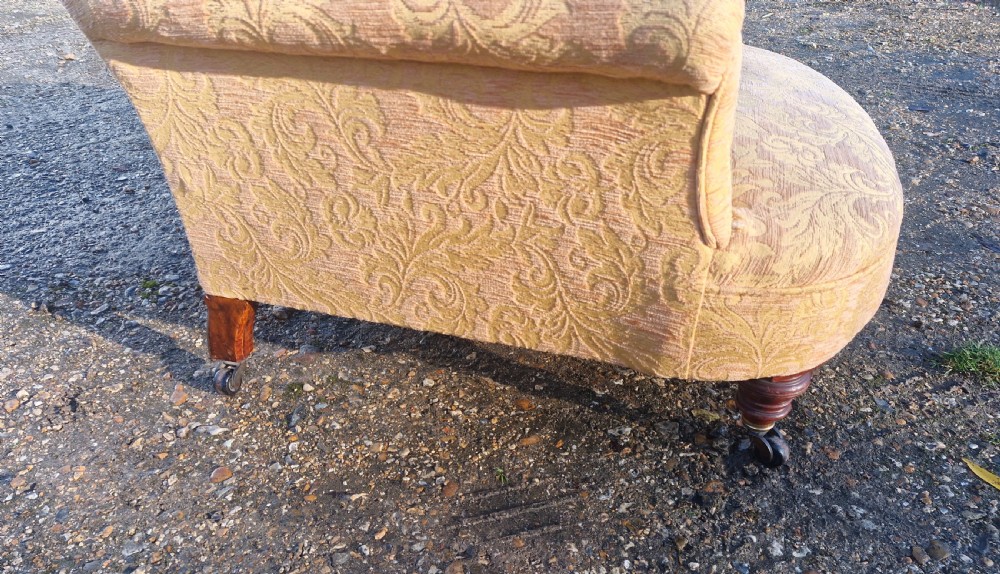 Late Victorian upholstered armchair in the style of Howard.  View VIII