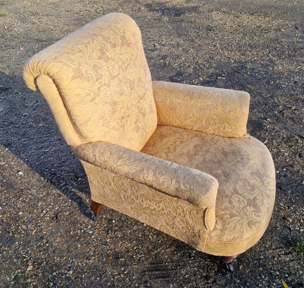 Late Victorian upholstered armchair in the style of Howard.  View IX