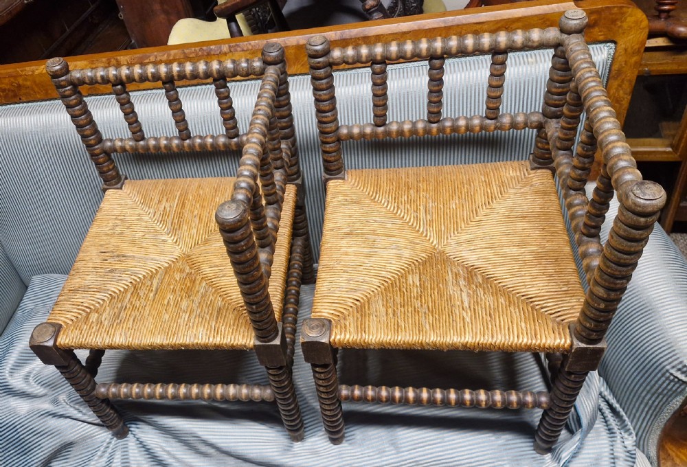 Pair of Bobbin framed rush seat corner chairs. View II