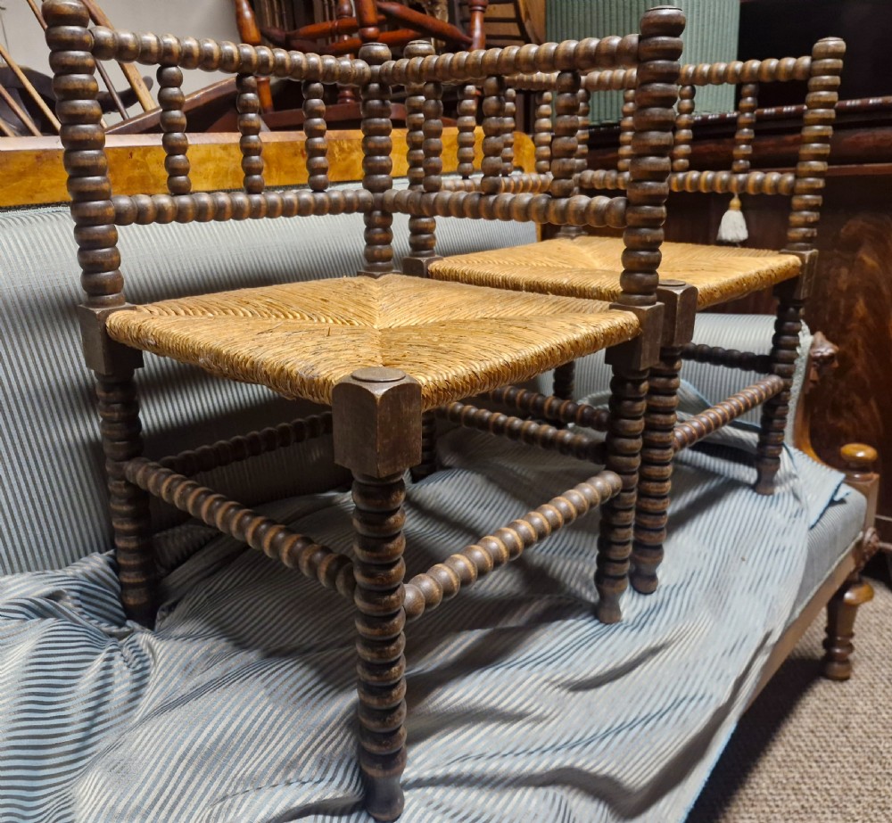 Pair of Bobbin framed rush seat corner chairs. View IV