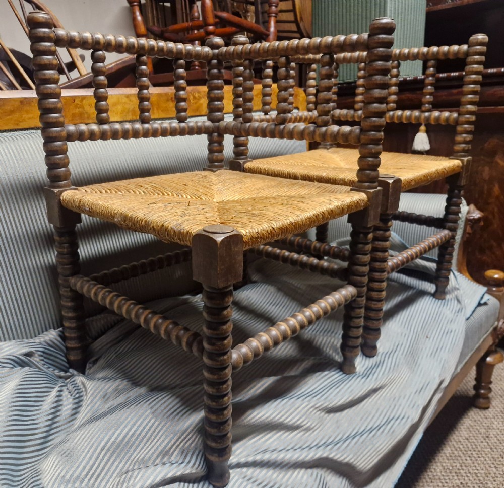 Pair of Bobbin framed rush seat corner chairs. View VI