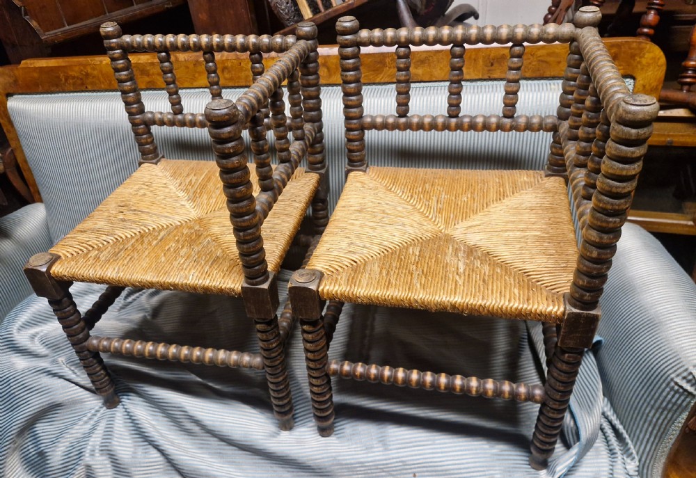 Pair of Bobbin framed rush seat corner chairs. View VIII