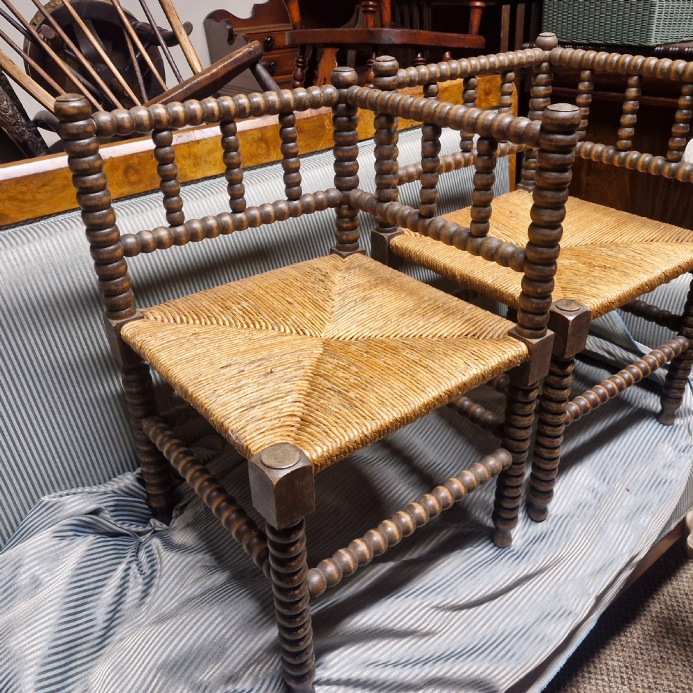 Pair of Bobbin framed rush seat corner chairs. View XII