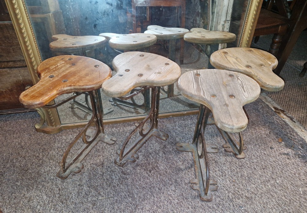 Set of 4 industrial machinist stools.