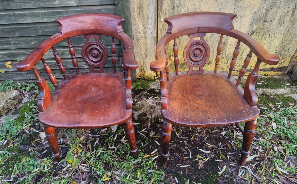 Pair of Victorian Bulls Eye Smokers bow armchairs. View III