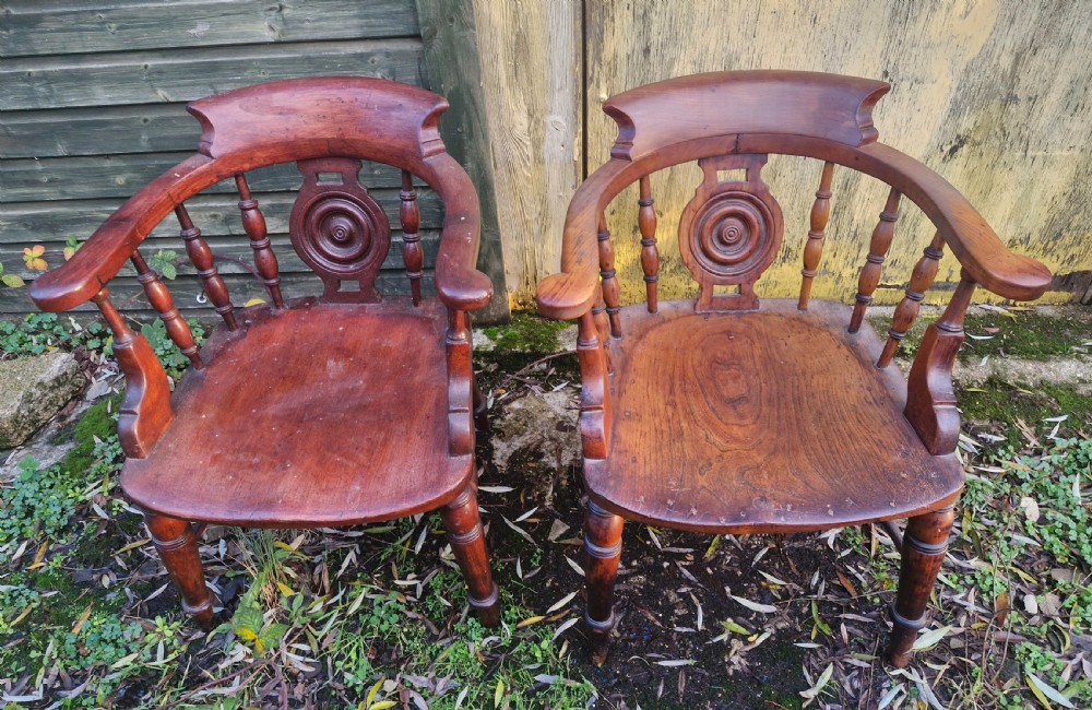Pair of Victorian Bulls Eye Smokers bow armchairs. View IV