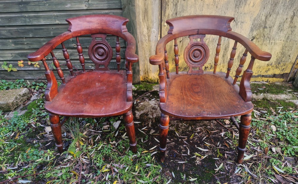 Pair of Victorian Bulls Eye Smokers bow armchairs. View VI