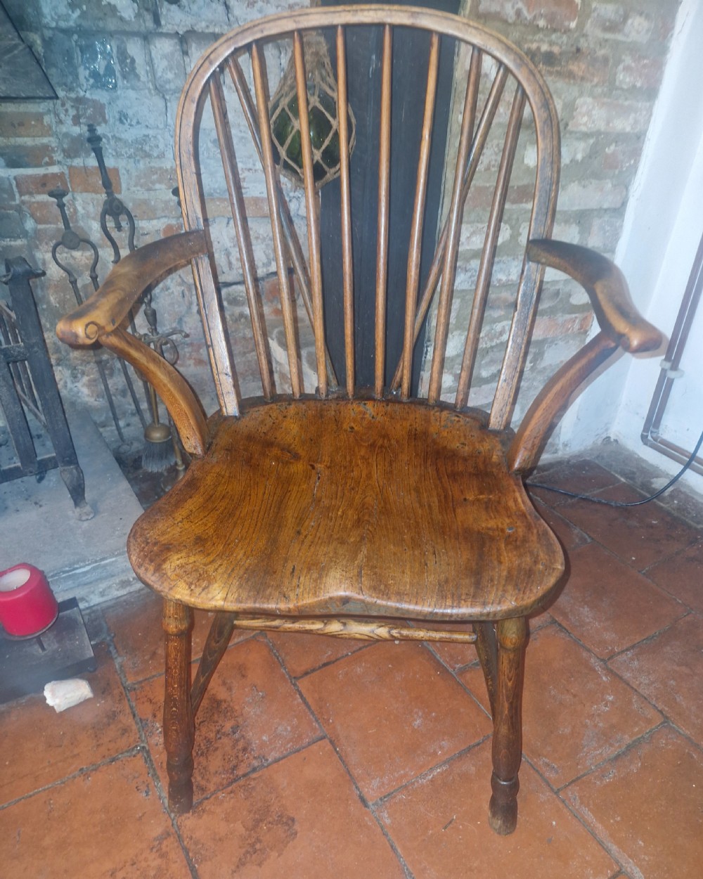 Early 19th century West Country stick back Windsor armchair.  View VIII