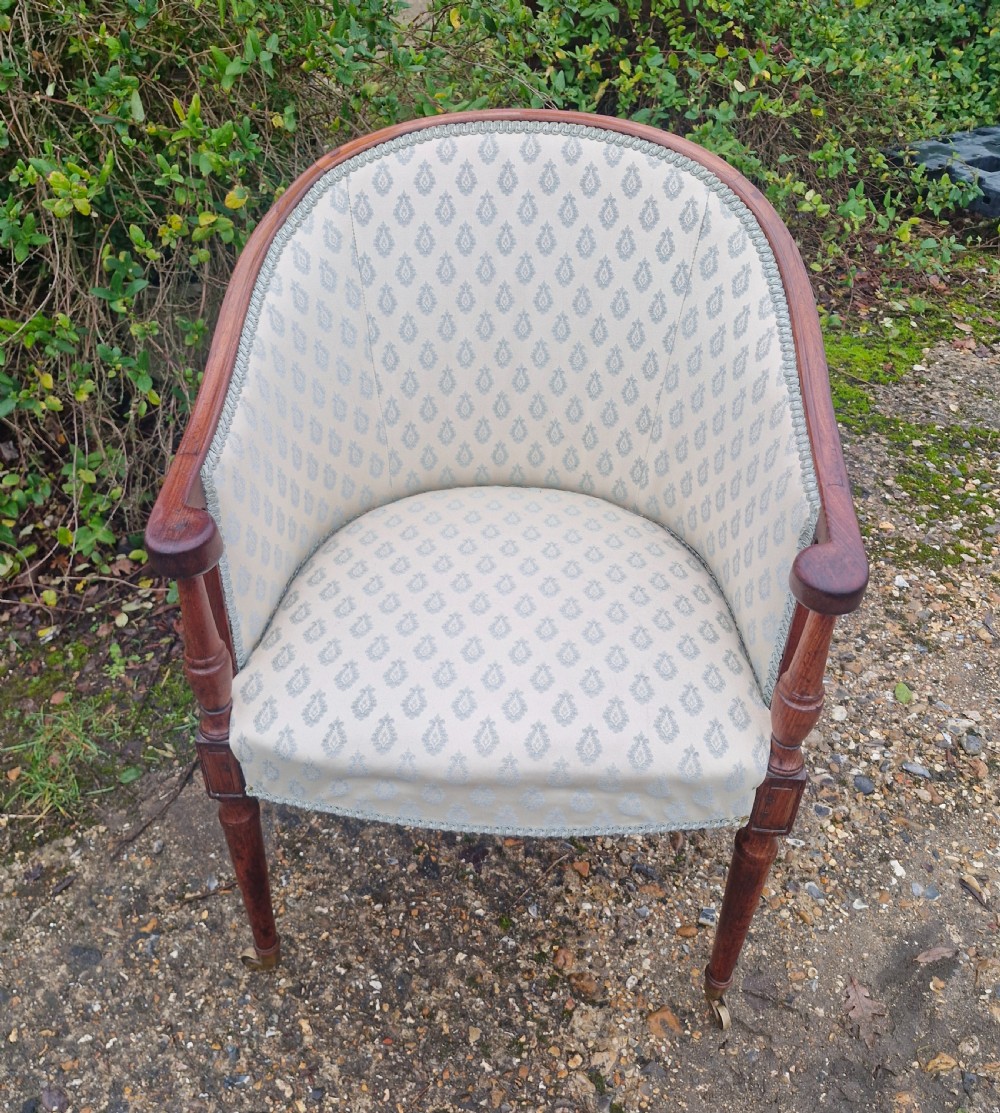 Elegant early 19th century mahogany desk armchair.  View XI