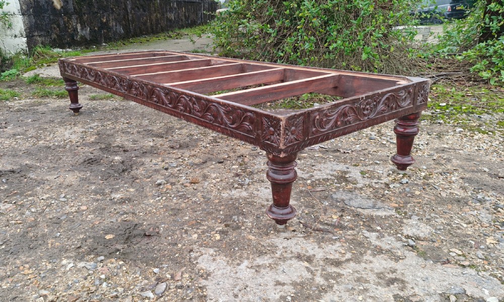 Large Anglo Indian country house centre stool for reupholstering. 
