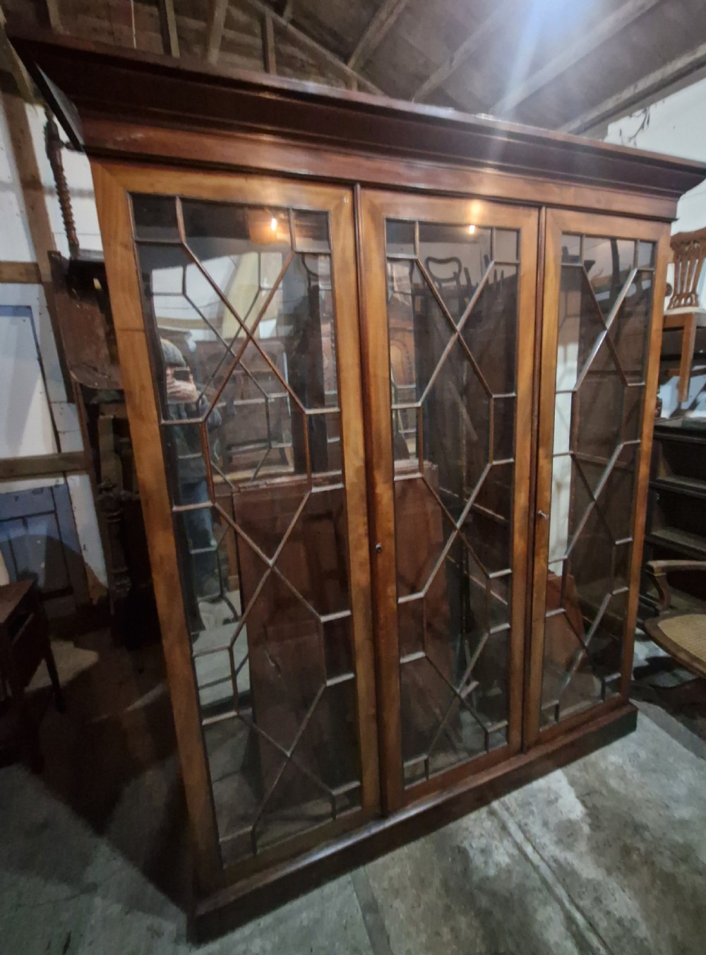 Mahogany 3 door glazed bookcase cabinet,adjustable shelves.  View IV
