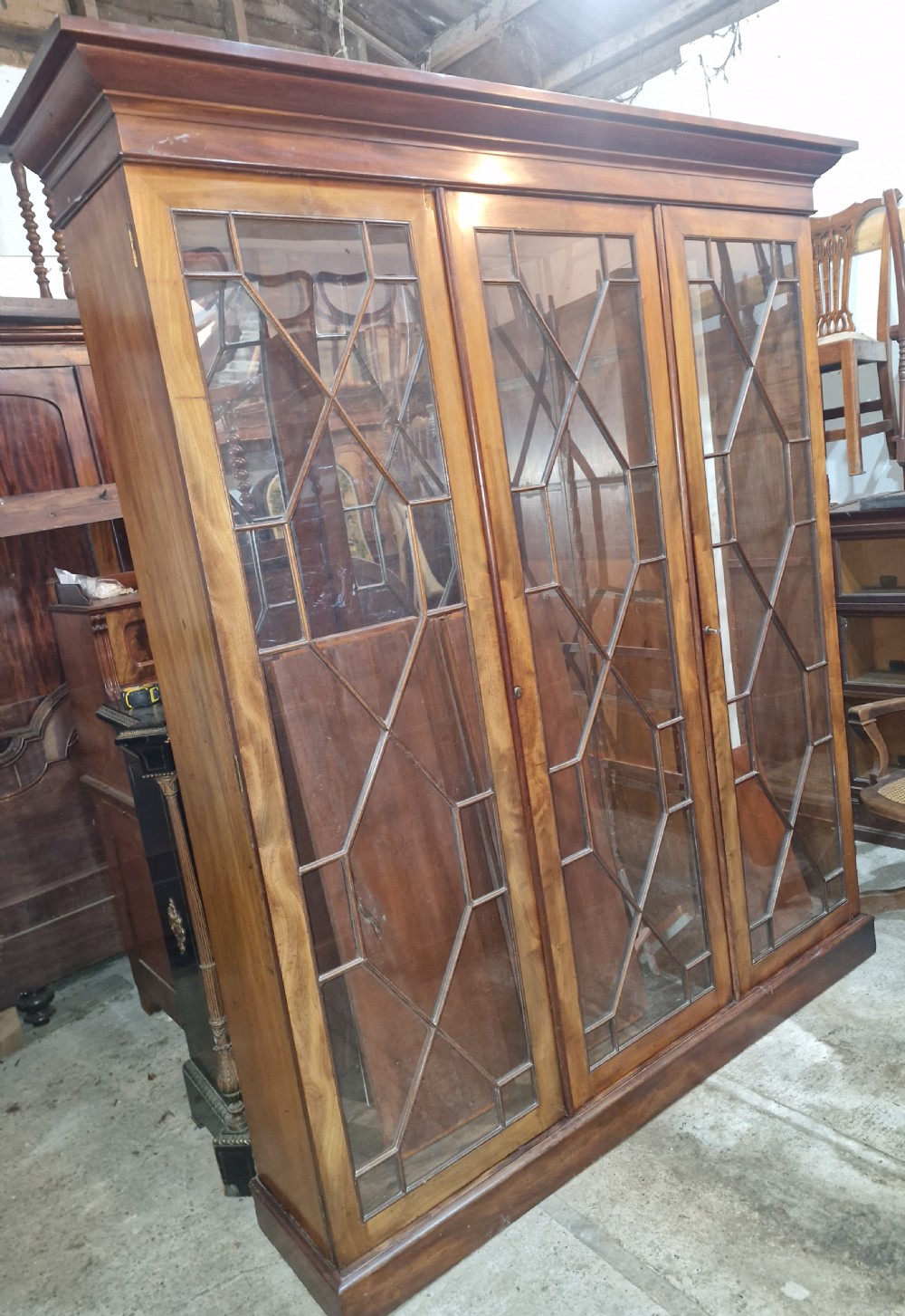 Mahogany 3 door glazed bookcase cabinet,adjustable shelves.  View X