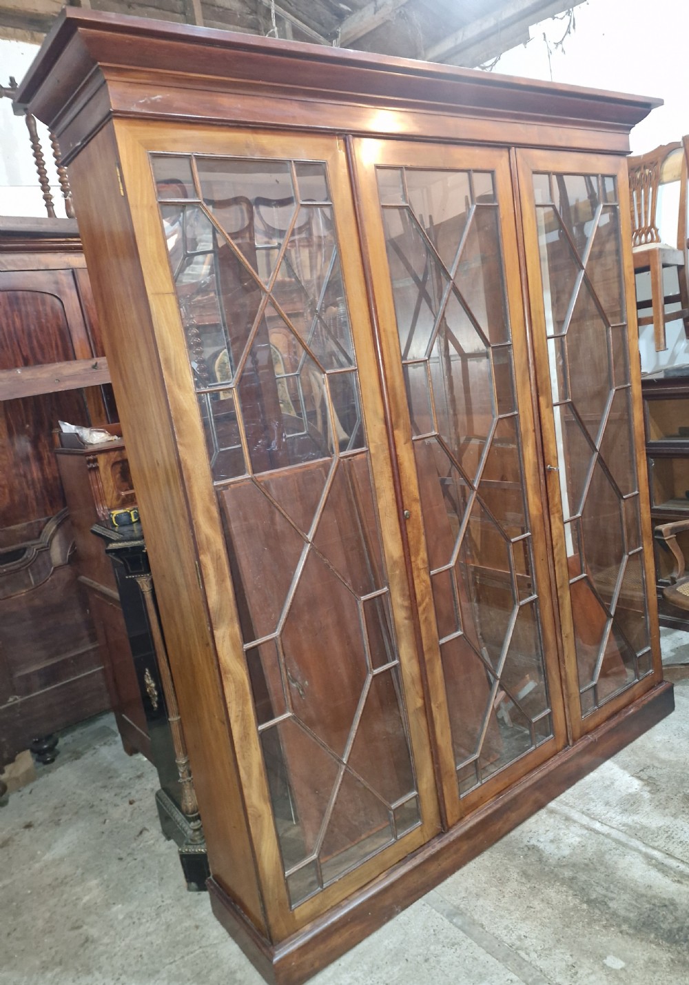 Mahogany 3 door glazed bookcase cabinet,adjustable shelves.  View XI