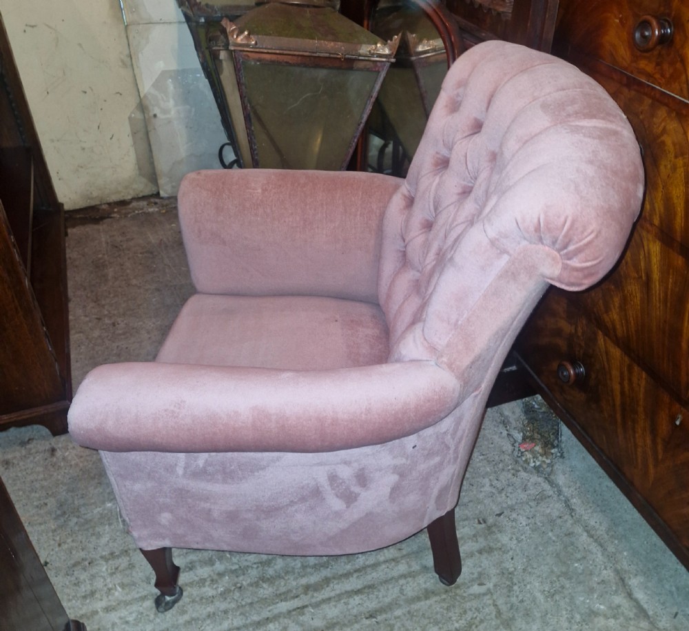 Edwardian button back upholstered armchair.  View IV