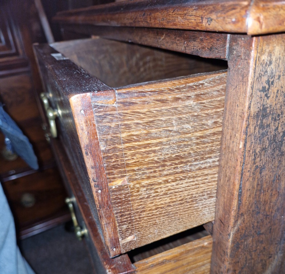 Neat Georgian mahogany chest of drawers of small size. View II