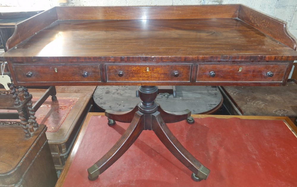 Unusual 19th century mahogany pedestal writing table or side table.