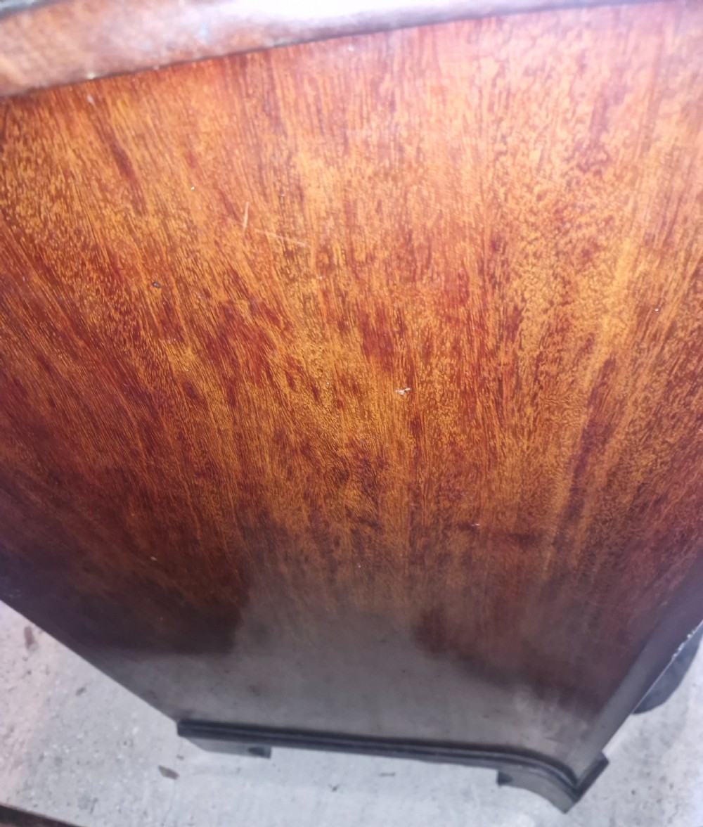 Early 19th century line inlaid mahogany serpentine front chest of drawers.  View VI