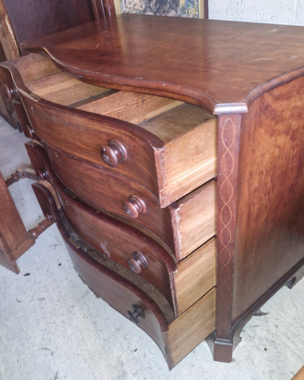 Early 19th century line inlaid mahogany serpentine front chest of drawers.  View XIII