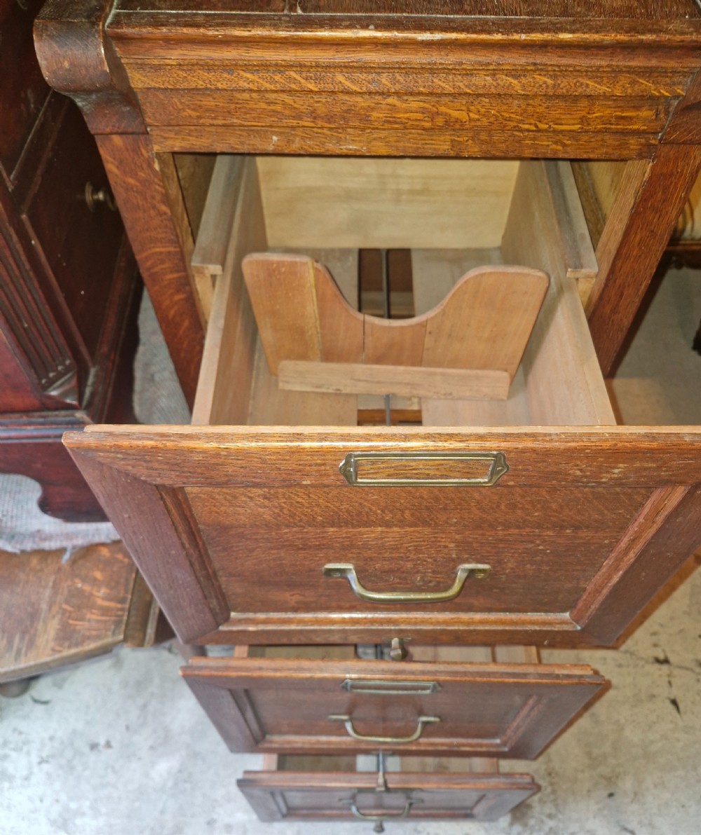Early 20th century oak 3 drawer filing office cabinet.  View IV