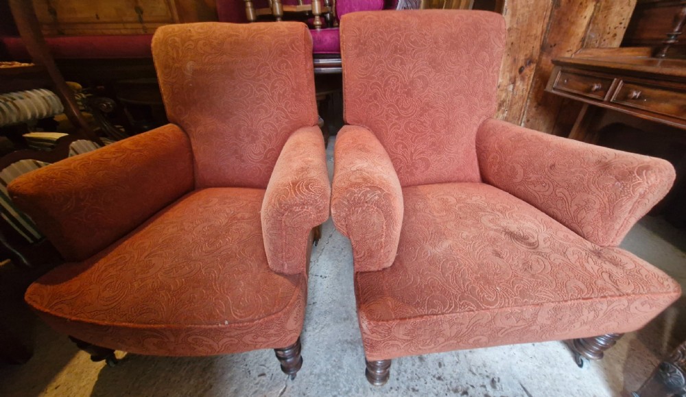A close matched pair of upholstered armchairs.  View VIII
