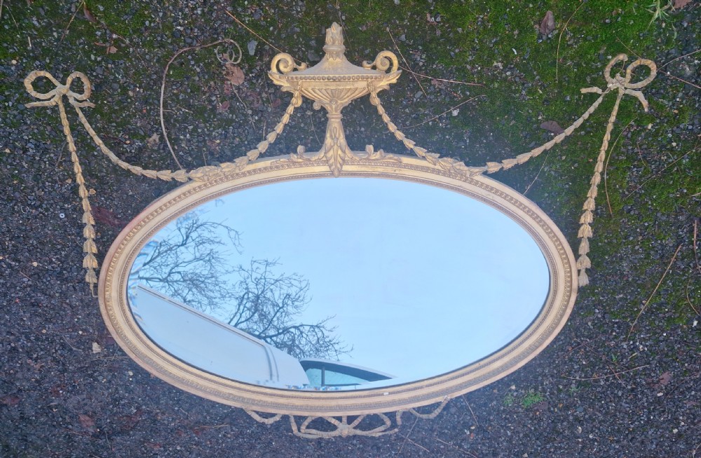 Edwardian gilt oval wall mirror.  View VII