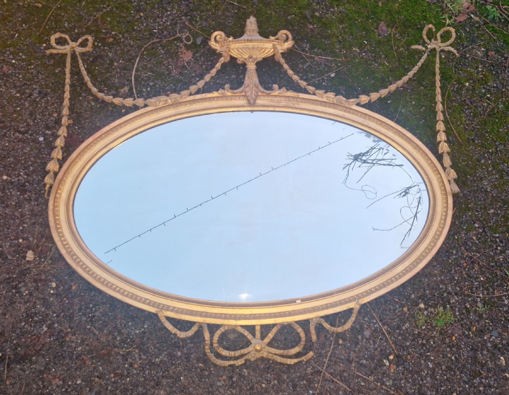 Edwardian gilt oval wall mirror.  View VIII