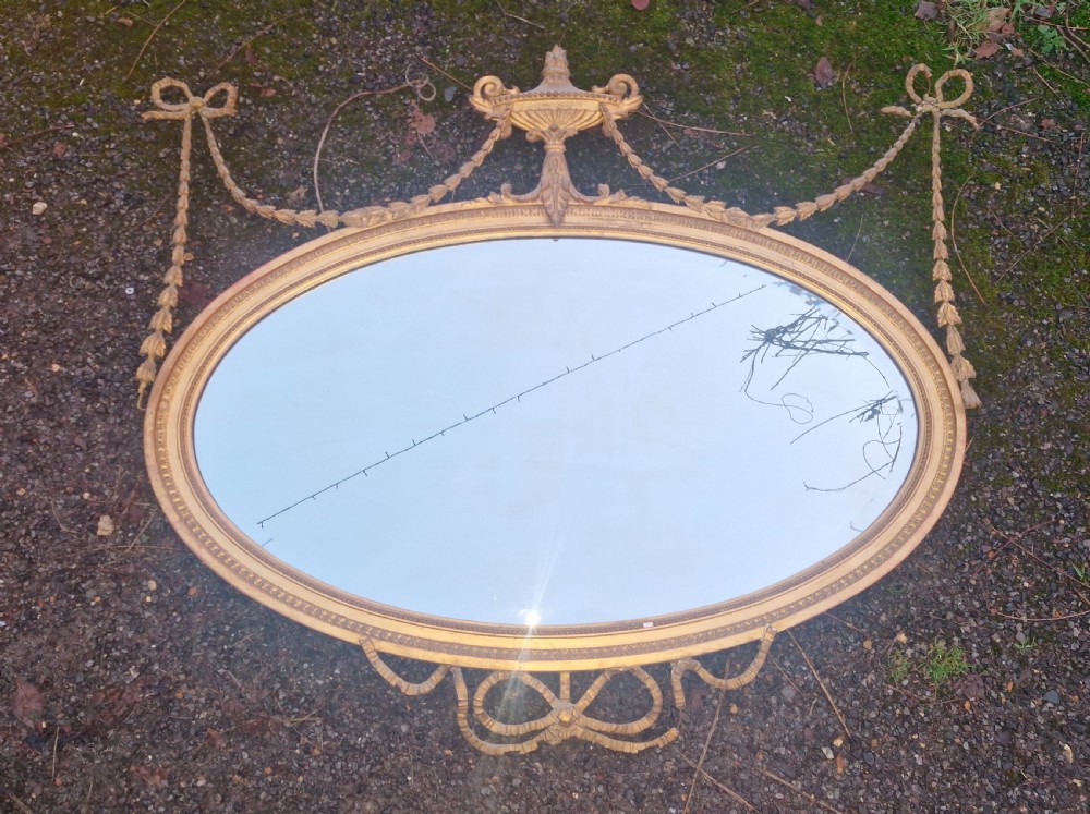 Edwardian gilt oval wall mirror.  View IX