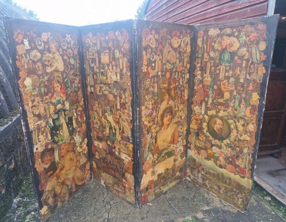 A Victorian four-fold wooden screen covered entirely in dense paper decoupage and scrapwork illustrations.