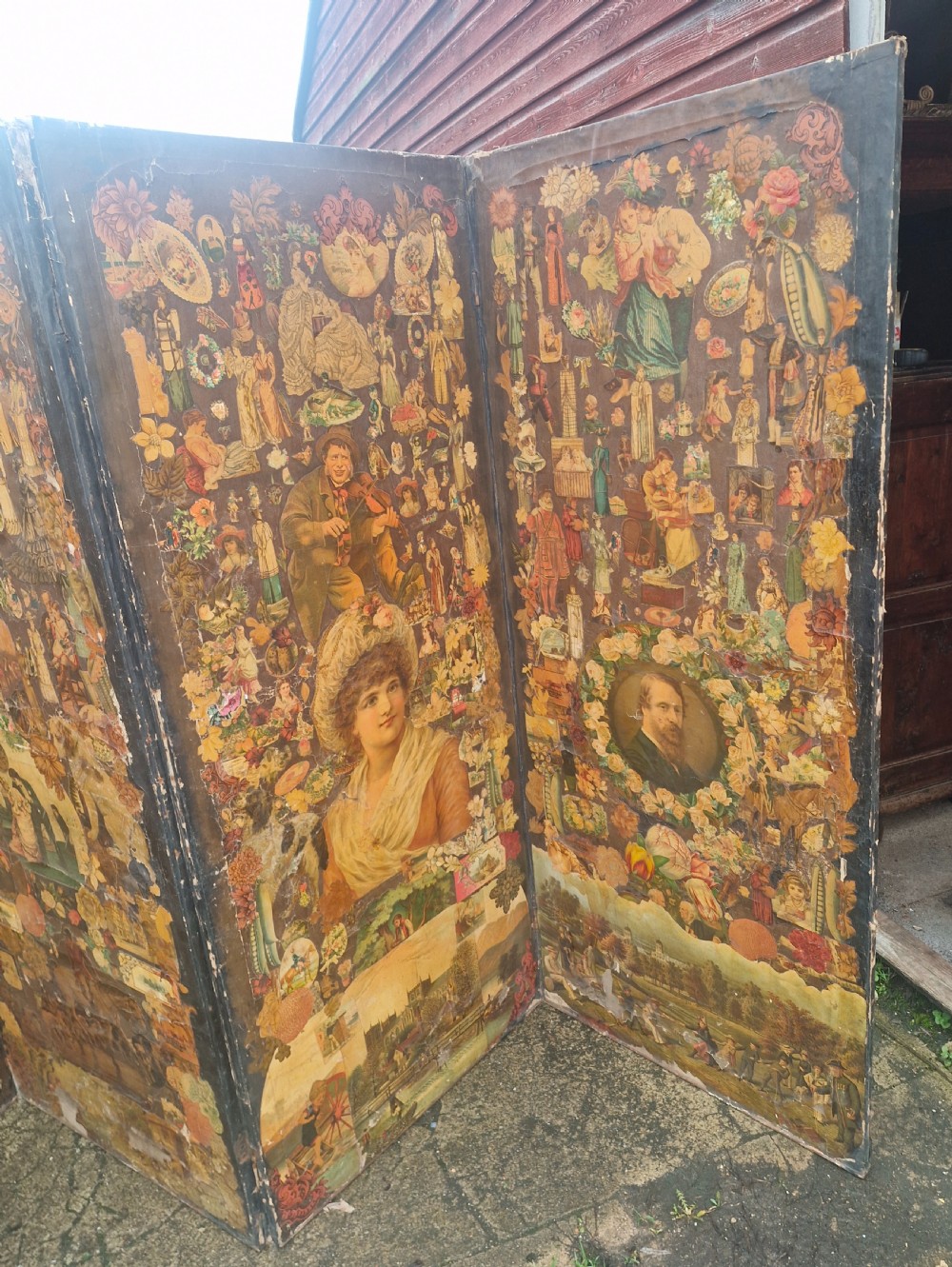 A Victorian four-fold wooden screen covered entirely in dense paper decoupage and scrapwork illustrations. View VI