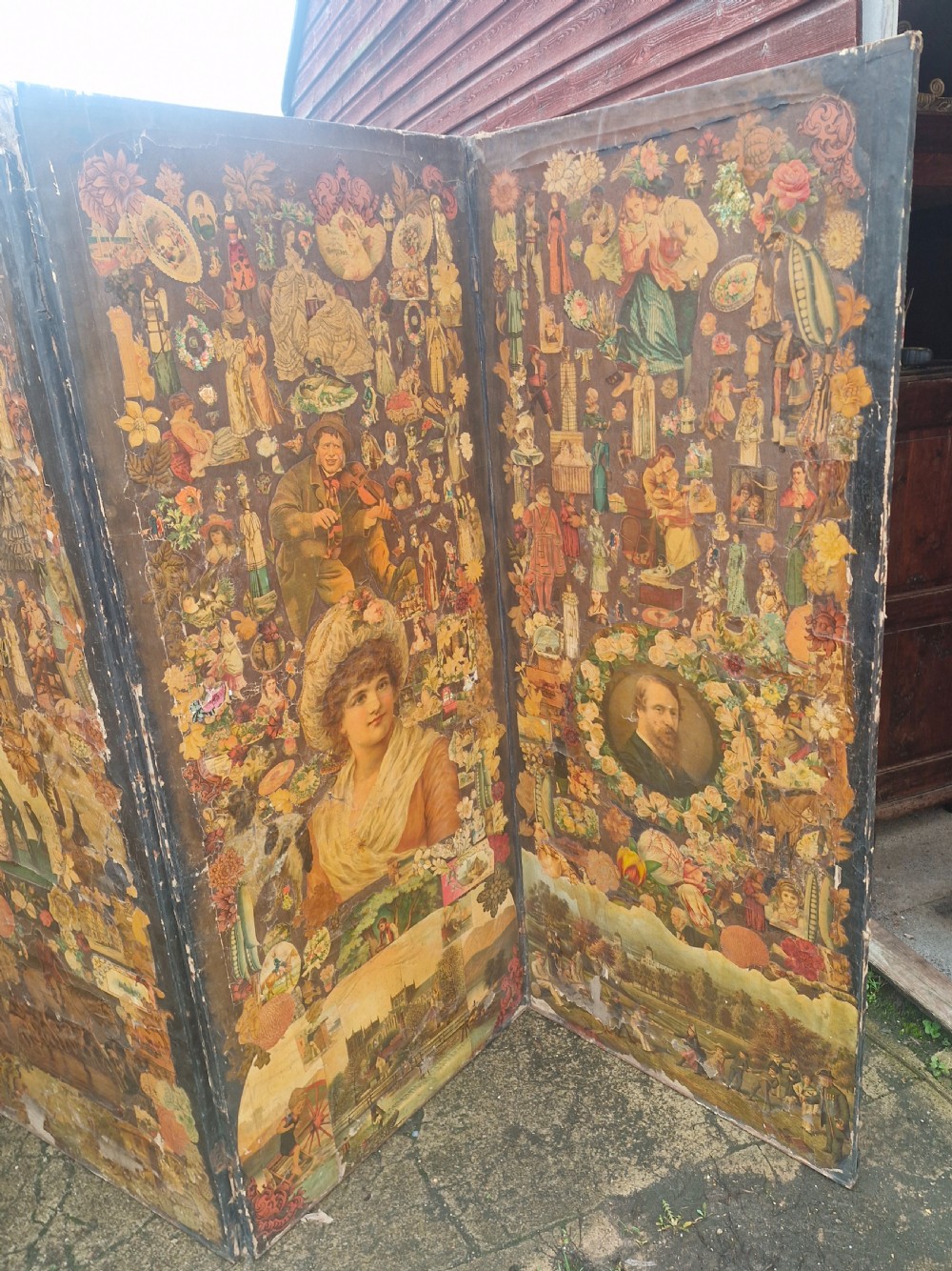A Victorian four-fold wooden screen covered entirely in dense paper decoupage and scrapwork illustrations. View VII