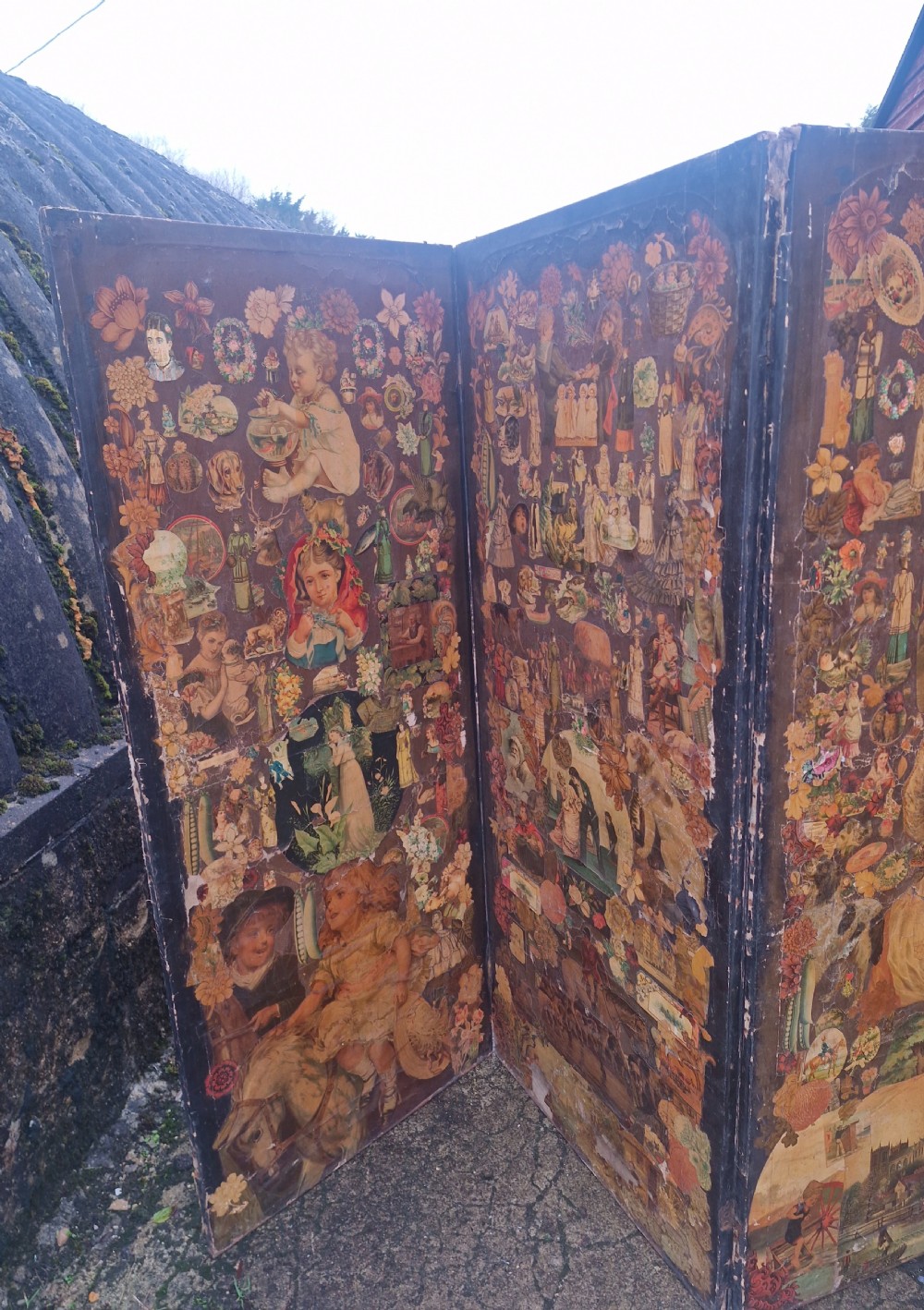 A Victorian four-fold wooden screen covered entirely in dense paper decoupage and scrapwork illustrations. View VIII