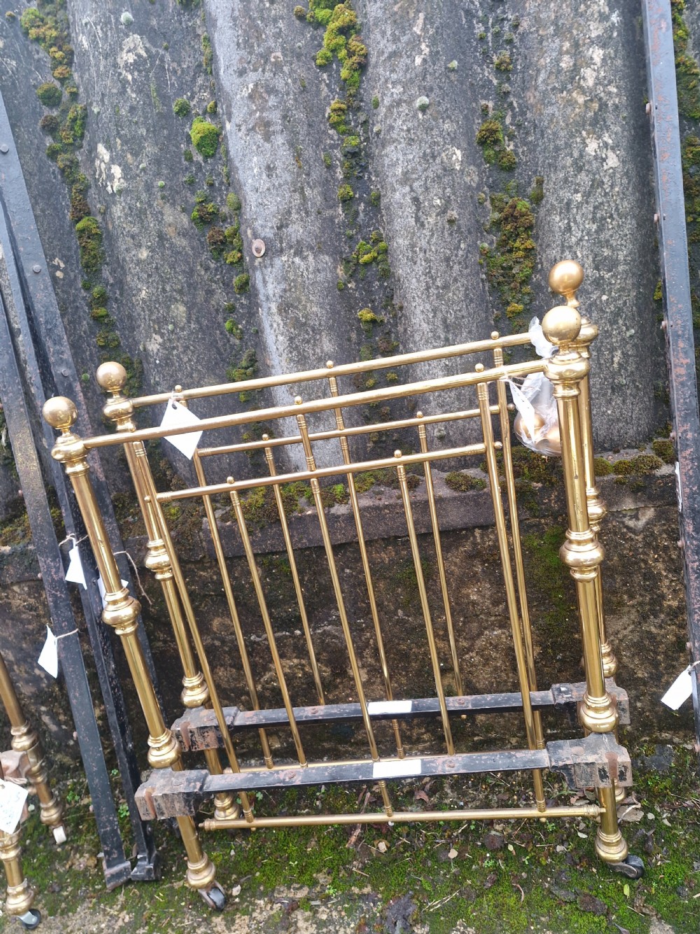 Pair of Late Victorian brass single beds with irons. View III
