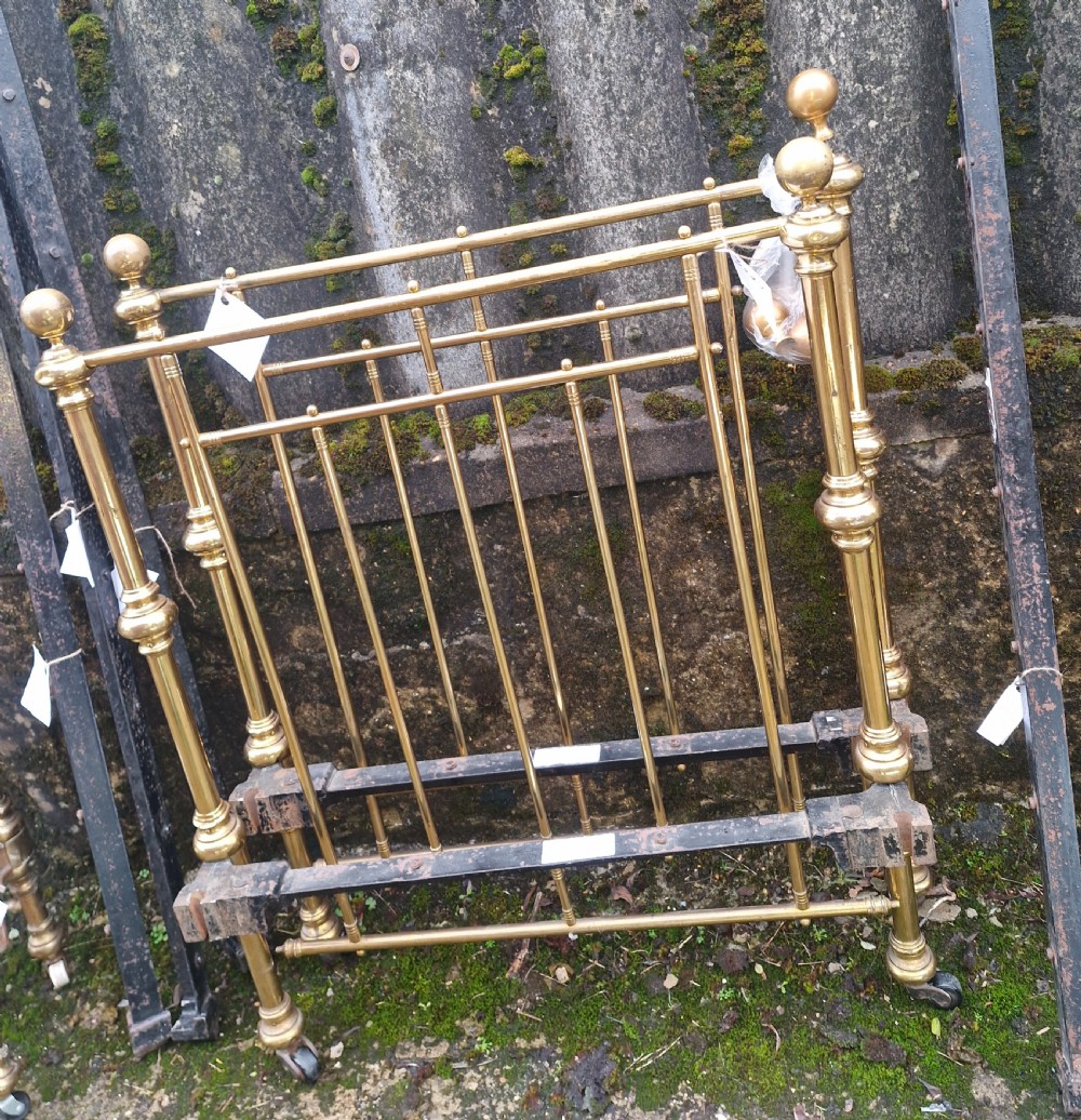 Pair of Late Victorian brass single beds with irons. View IV
