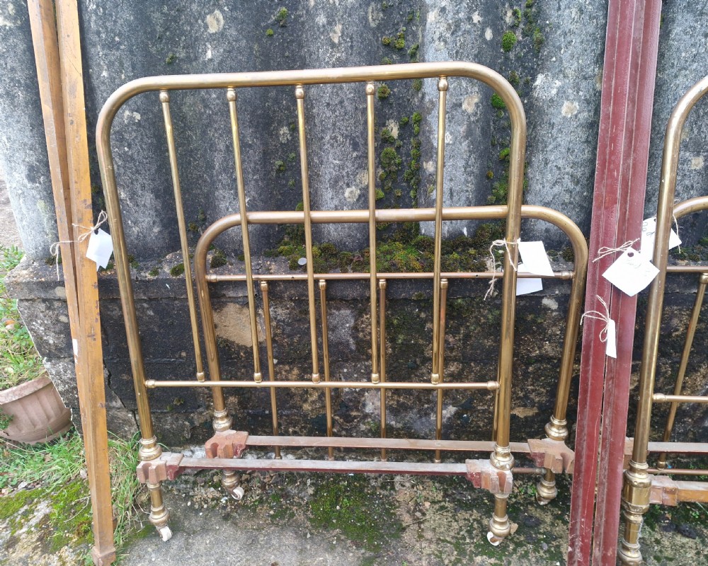 Pair of Edwardian brass single beds. View VI