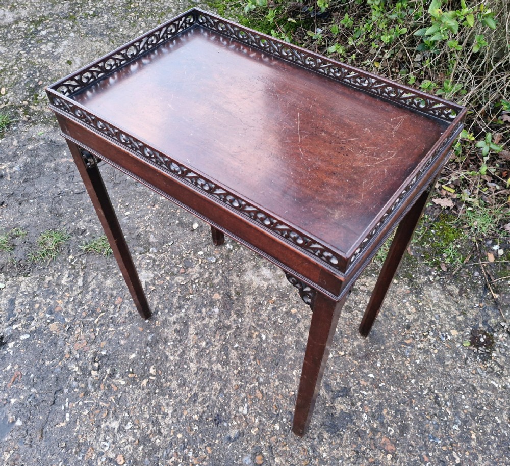Small mahogany silver table with fret work gallery.  View VI