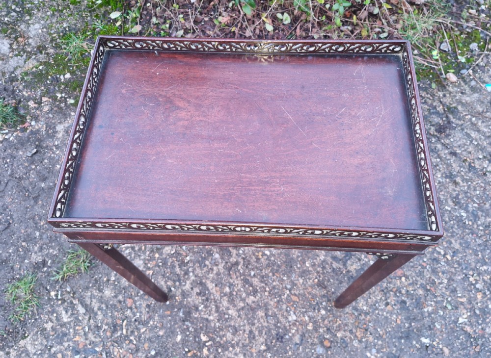 Small mahogany silver table with fret work gallery.  View VIII