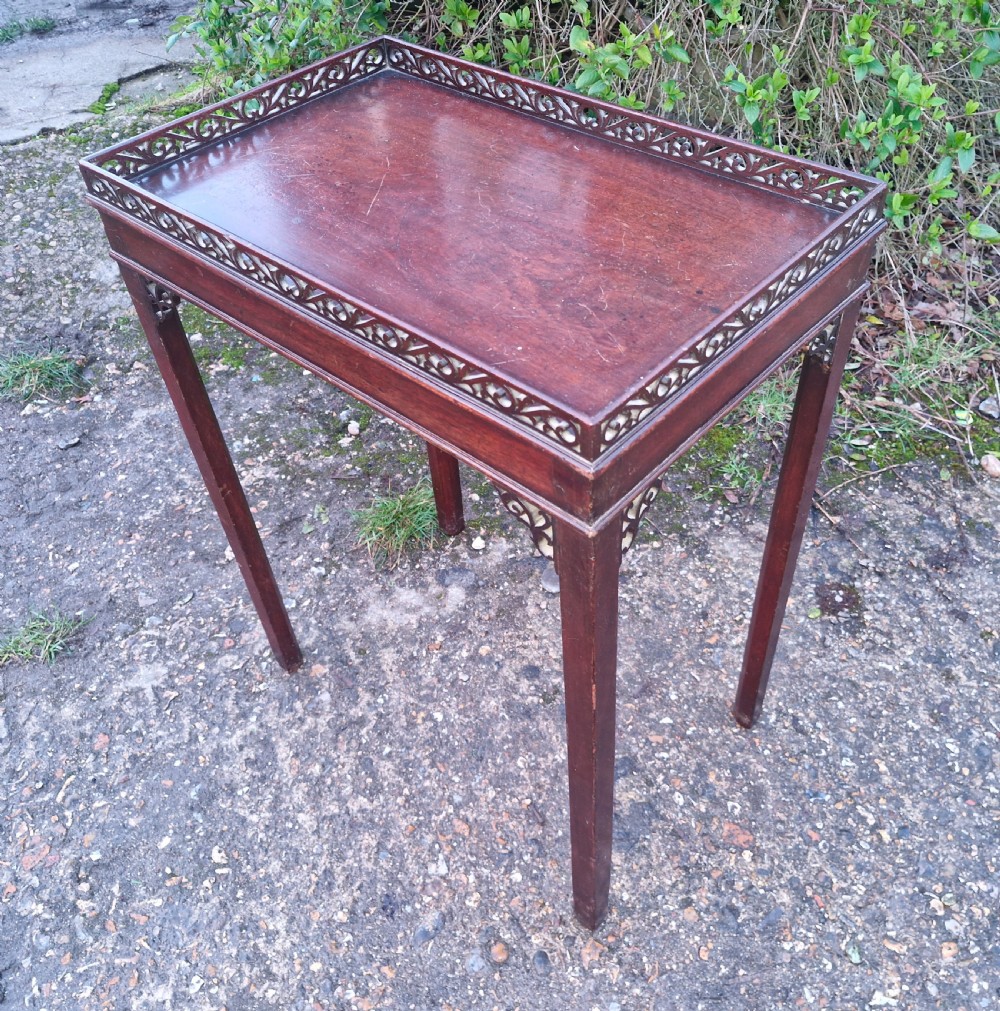 Small mahogany silver table with fret work gallery.  View IX