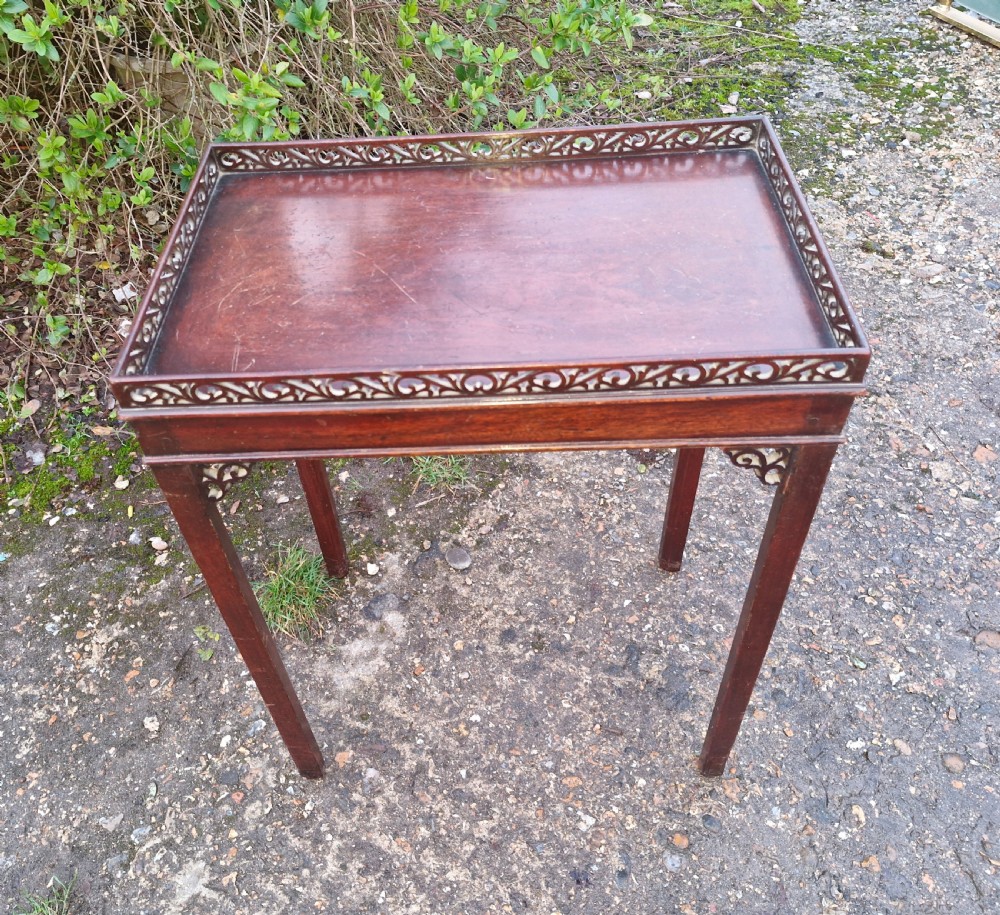 Small mahogany silver table with fret work gallery.  View XII